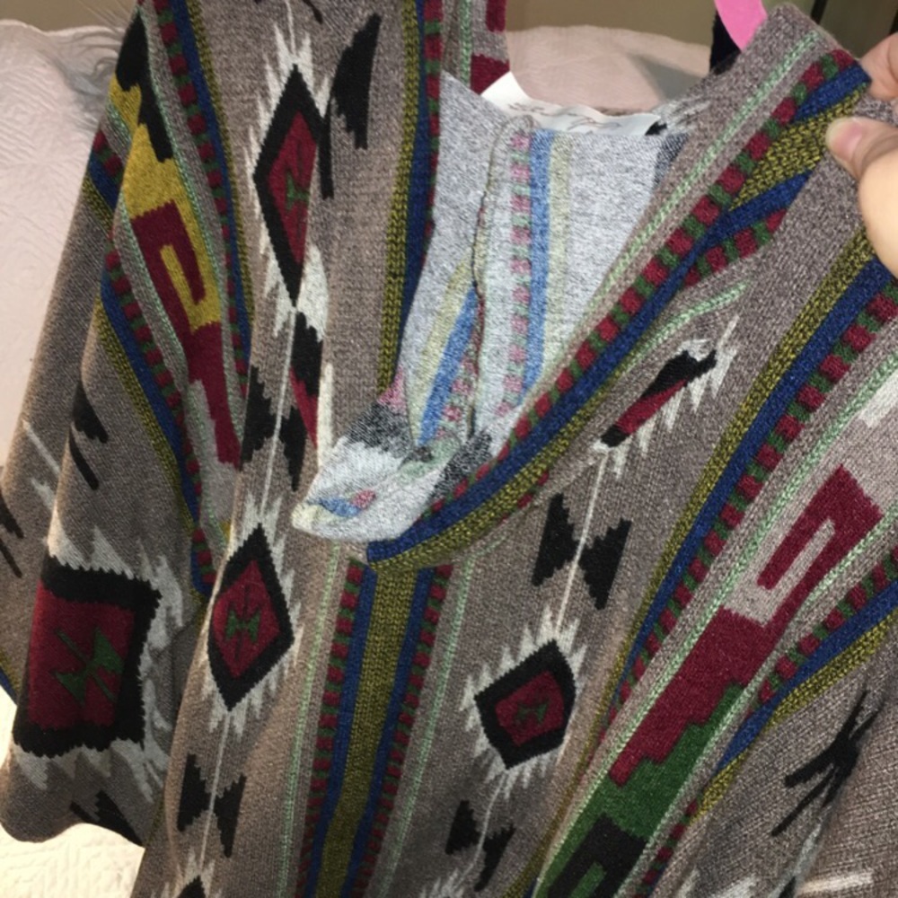 Sweater multi color. Maybe worn once. Like new